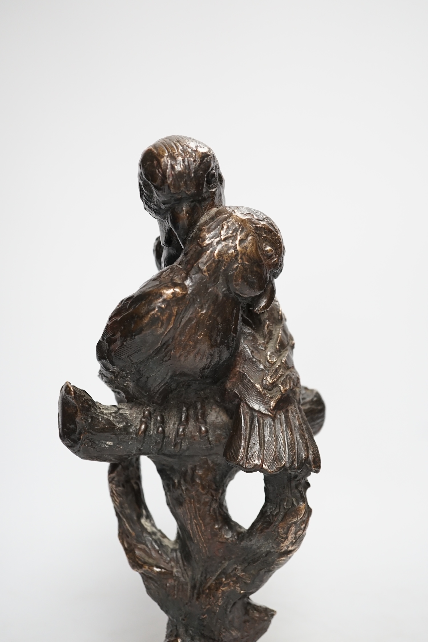 A bronze of two parrots in a tree, with impressed mark, 36cm high